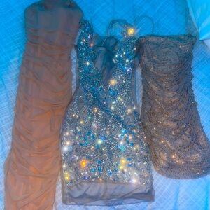 The 1st and last dress are from oh polly snd the middle one is from a boutique